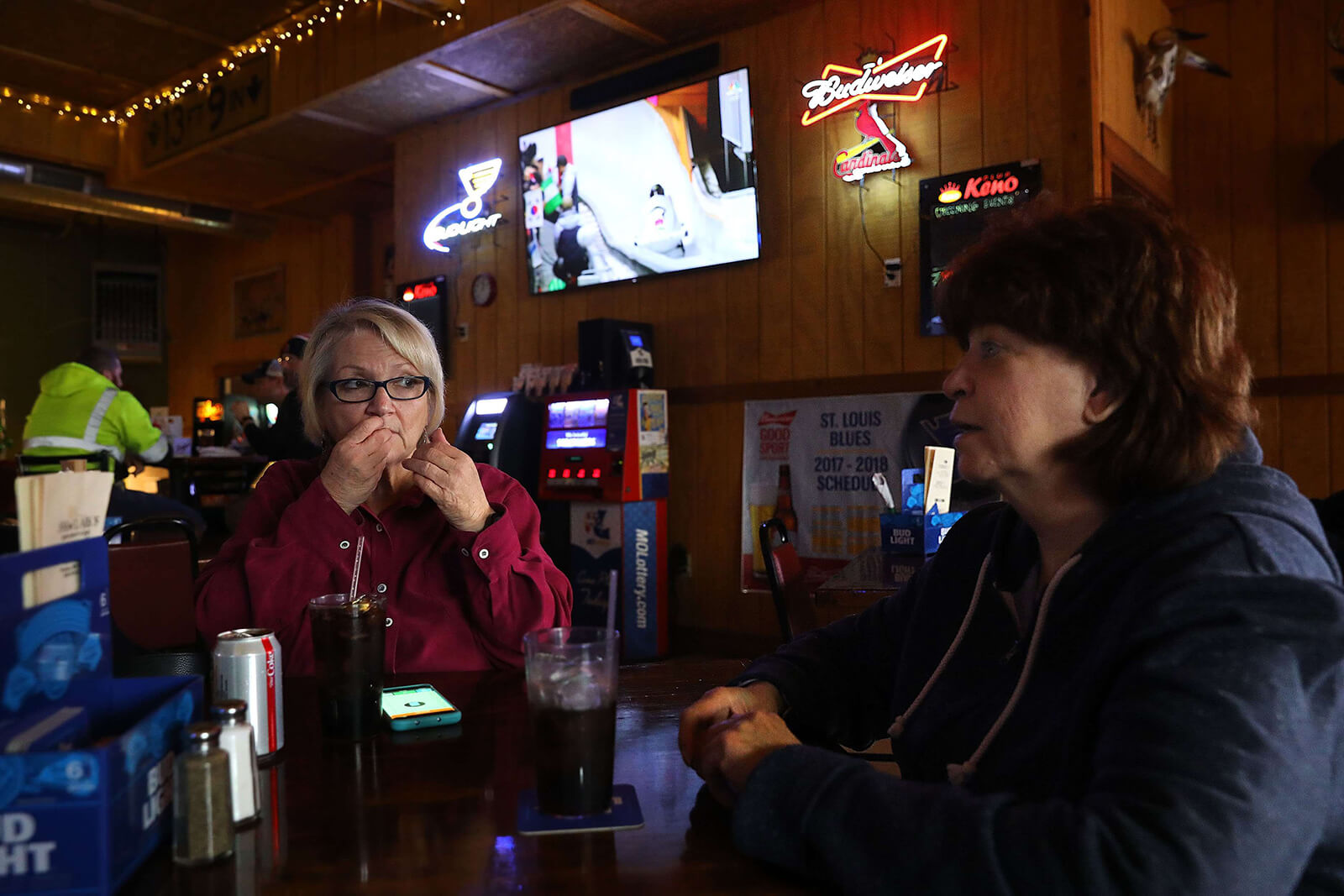 Lonni Schicker (left) has lunch with her friend Susan Miller at Joe Clark's Restaurant in Fenton on Wednesday, Feb. 21, 2018. Since returning to St. Louis after her initial diagnosis of mild cognitive impairment, Lonni has just a handful of friends she relies on for companionship and favors.