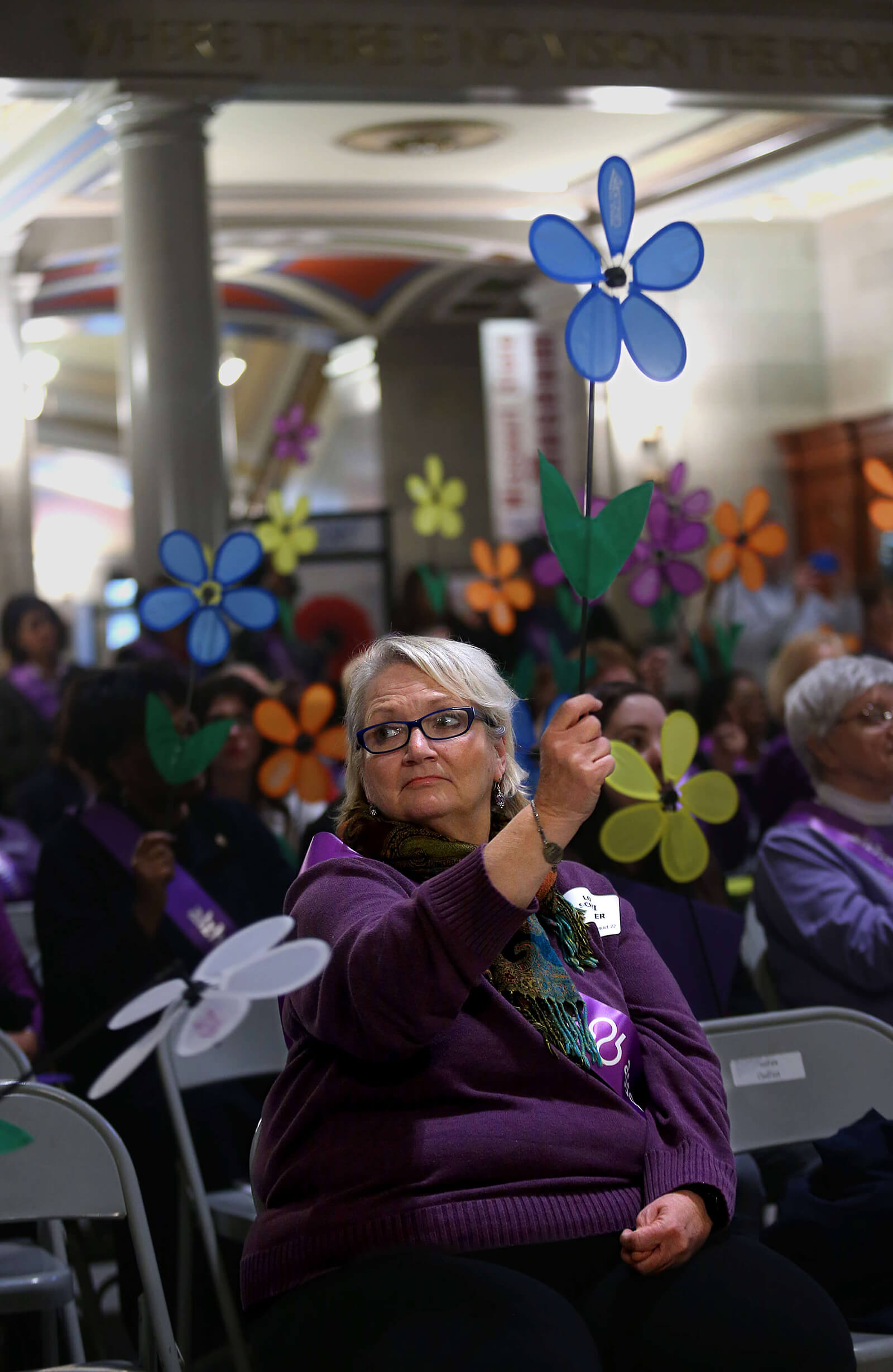 Lonni Schicker was among the advocates for people with dementia during an Alzheimer's Association program in the Missouri Capitol on Wednesday March 7, 2018. During the trip to Jefferson City sponsored by the group's Greater Missouri Chapter, hundreds of volunteers lobbied lawmakers to fund programs that would help families care for loved ones with dementia and held a rally to draw attention to their cause.