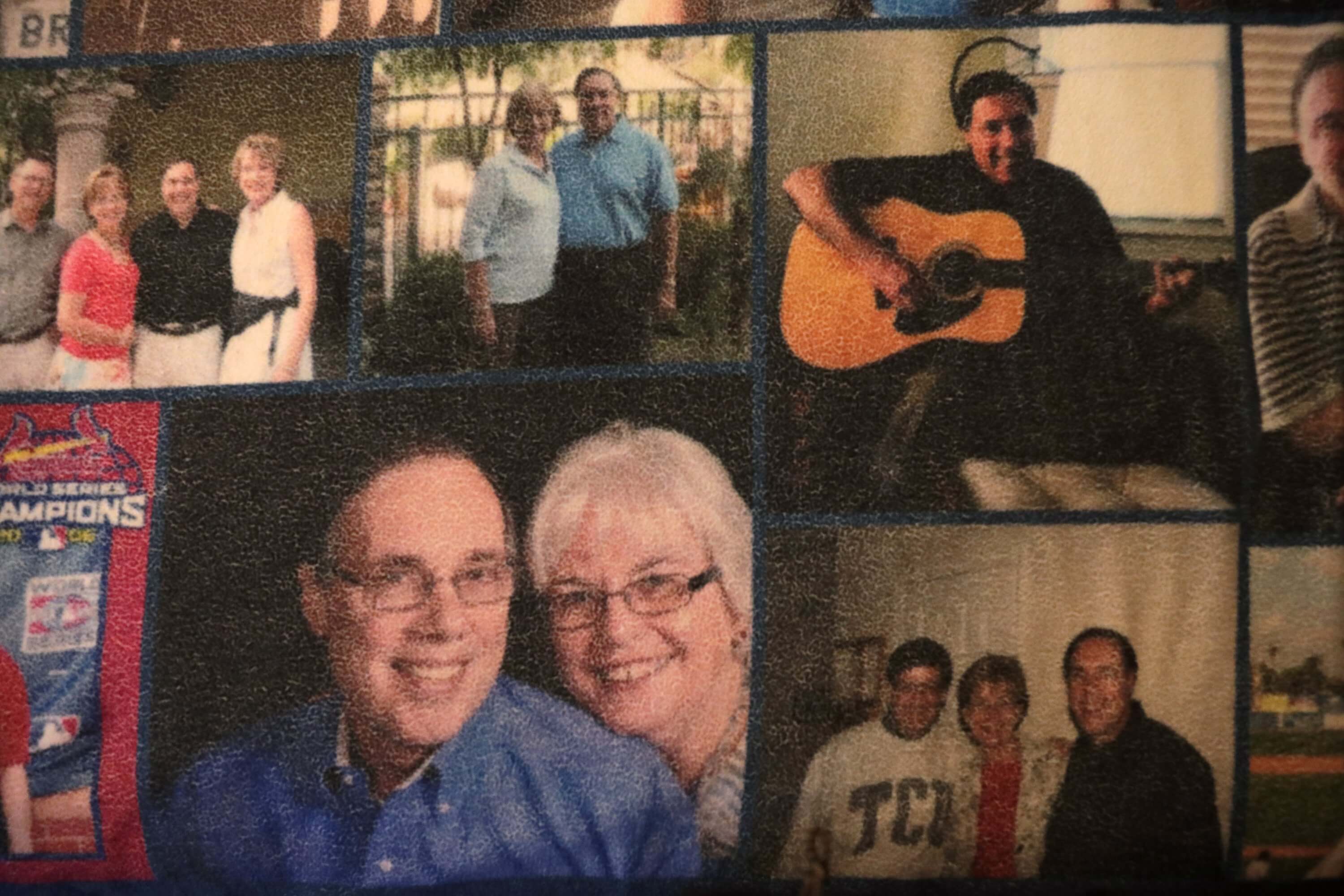 A blanket printed with family photos of Ron Nicoletti with family and friends lays across Nicoletti's bed at a skilled nursing facility in Valley Park on Thursday, Dec. 13, 2018. Ron was diagnosed with early onset Alzheimer's at age 60. His wife, Mary, visits almost every day.